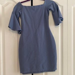 Hugs the the body, very stylish, date night or church dress